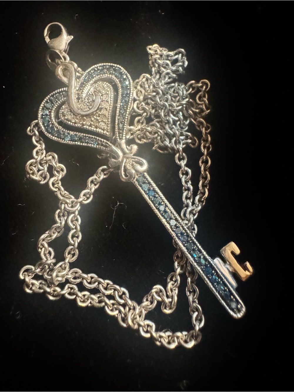 925 Silver Heart Key Pendant Necklace with Blue diamonds, India.